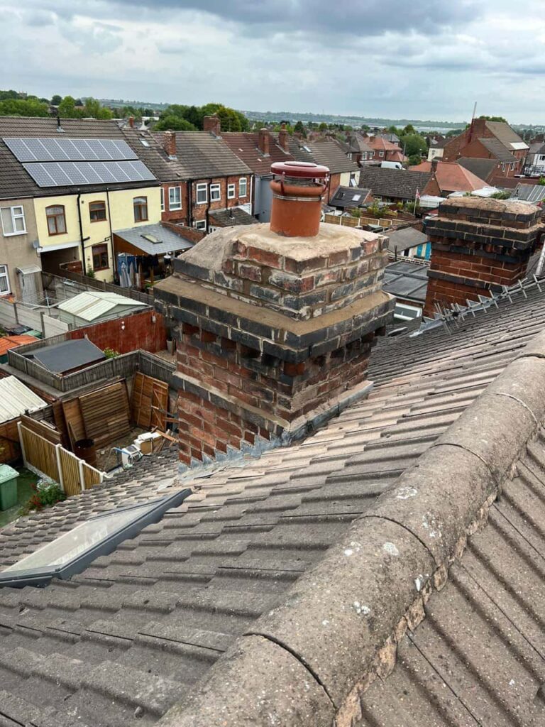 This is a photo taken from a roof which is being repaired by MCM Roofing Repairs Ringwood, it shows a street of houses, and their roofs